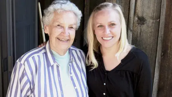 Susan and Alice posing for a photo